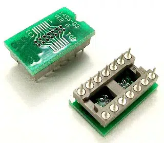 Close-up view of the PA-SSD3SN=M18-14, 14-Pin SSOP & TSSOP SMT-to-DIP Adapter, showcasing its dual compatibility surface mount pad for SSOP and TSSOP devices and .018 round pins for DIP plug connection.